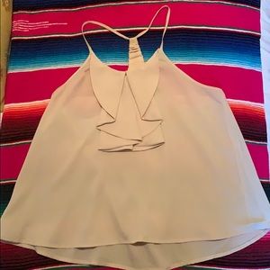 Flowy cream too with front bow like detail